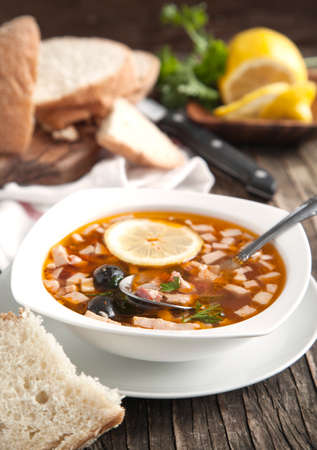 Solyanka, Russian soup with meat, sausage, olives and pickles