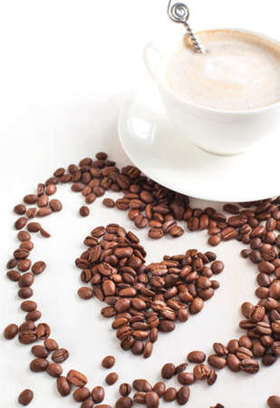 Cup of coffee and coffee beans  Selective focus の写真素材