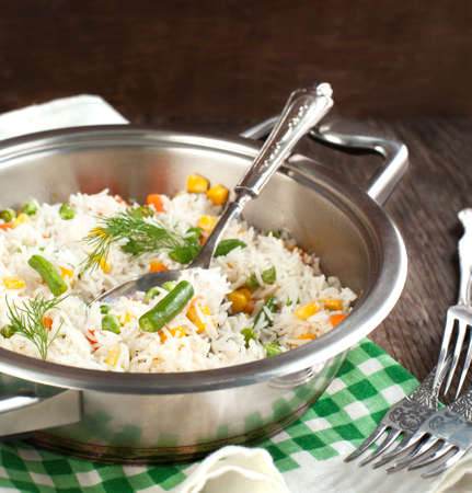 Rice with  mixed vegetables in panの写真素材