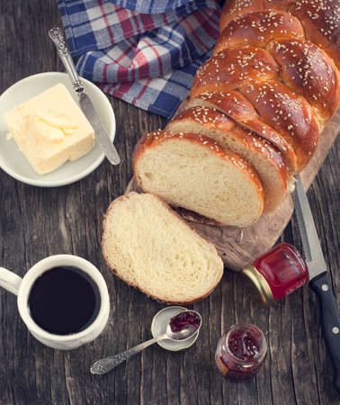 Freshly baked sweet braided bread loafの写真素材