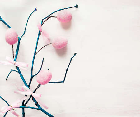 Easter eggs hanging on a branch の写真素材