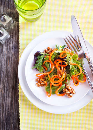 Spring green salad with carrotの写真素材