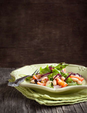 Salad with tomato and white beansの写真素材