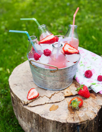 Lemonade with raspberry  Selective focusの写真素材