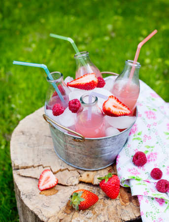 Lemonade with raspberry  Selective focusの写真素材
