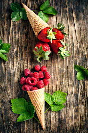 Raspberry and strawberry in sugar conesの写真素材