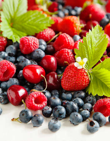 Assortment of summer fresh berriesの写真素材