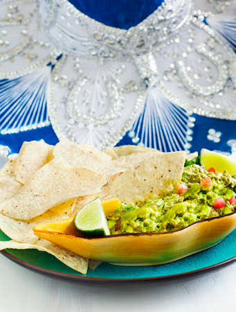 Fresh guacamole with corn tortilla chipsの写真素材