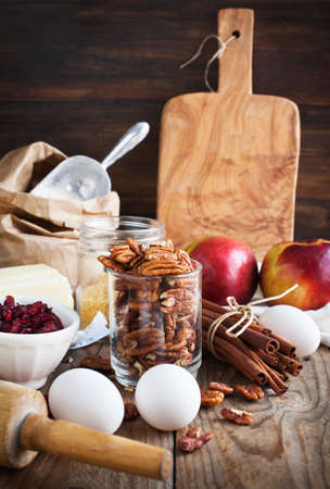 Baking ingredient on wooden background. Fall or winter baking.の写真素材
