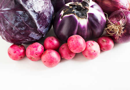 %u0421ollection of fresh purple toned vegetables on white wooden の写真素材