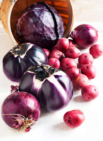 &#1057;ollection of fresh purple toned vegetablesの写真素材