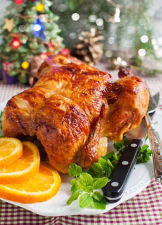Whole roasted chicken for Christmas dinnerの写真素材