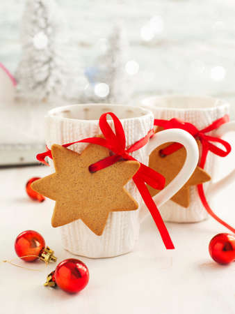 Two cups of hot tea and gingerbreadの写真素材