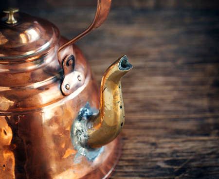 Old copper kettleの写真素材