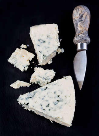 Blue cheese on dark backgroundの写真素材