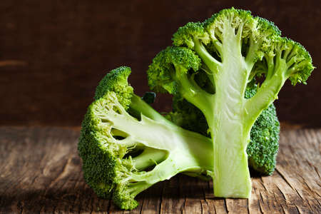 Fresh broccoli on wooden backgroundの写真素材