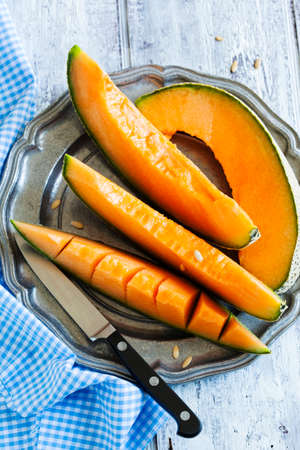 Cantaloupe melon slices.の写真素材