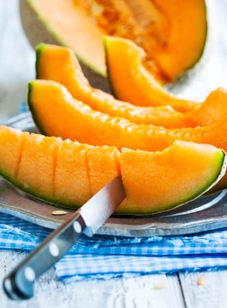Cantaloupe melon slices.の写真素材