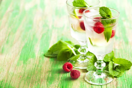 Raspberry lemonade with lime and mint