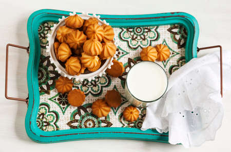 Glass of milk and cookies. Top view