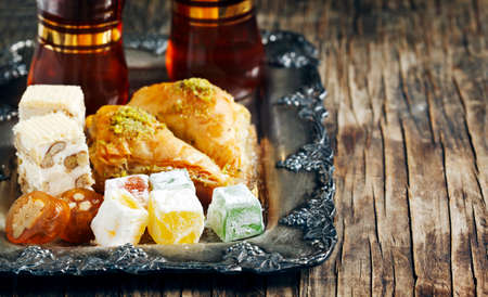 Turkish sweets. Baklawa, mixed Lokum, Grape Molasses with walnut, Nougat with walnutの写真素材