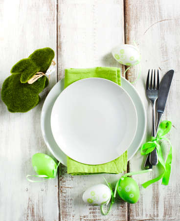 Easter table setting with green bunny decoration