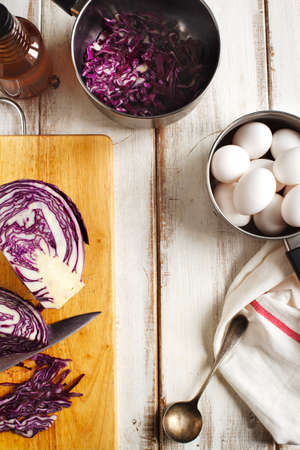 Homemade decoration eggs natural way. Naturally coloring Easter eggs with red cabbageの写真素材