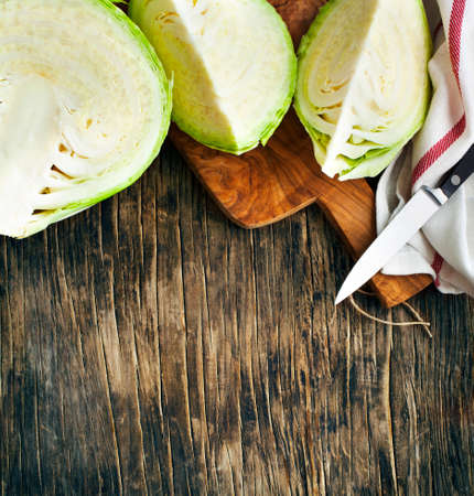 Fresh cabbage on wooden backgroundの写真素材