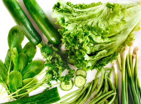 Fresh green vegetables on wooden backgroundの写真素材