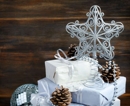 Christmas gift wrapped in paper and Christmas decorationの写真素材