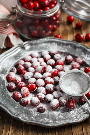 Fresh cranberries with powdered sugarの写真素材