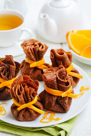 Chocolate pancakes with orangeの写真素材