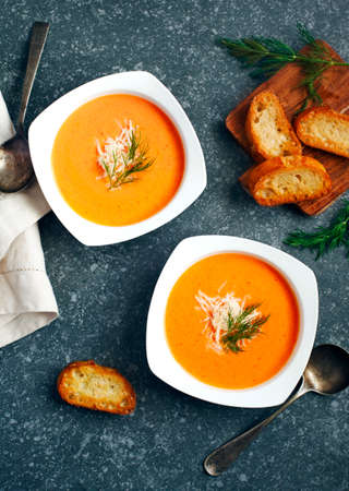 Tomato soup in plate, top view. Zuppa di Pomodoroの写真素材