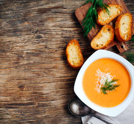 Tomato soup served in plate, top view. Zuppa di Pomodoroの写真素材