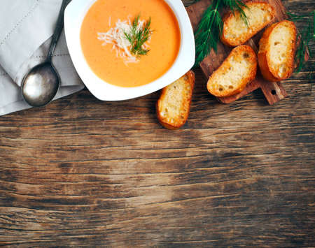 Tomato soup in plate, top view. Zuppa di Pomodoroの写真素材