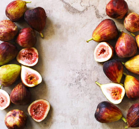 Fresh Figs on stone background with copy space
