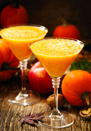 Pumpkin alcohol cocktail for fall and halloween partiesの写真素材