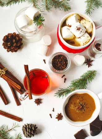 Hot chocolate with spicy, marshmallows and spicy tea, top viewの写真素材