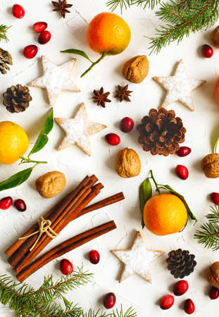 Christmas cookies, decoration and gifts on white background, top view