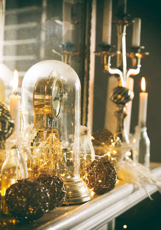 Mantelpiece with Christmas decor. Vintage toned image, grain textureの写真素材