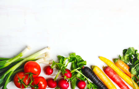 Fresh vegetables ingredients white background, vegetarian food and diet nutrition concept, top view, borderの写真素材