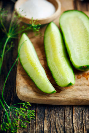 Fresh cucumber, dill and salt. Prepared for picklingの写真素材