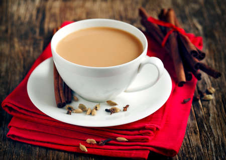 Indian black tea. Masala tea. Spiced tea with milkの写真素材