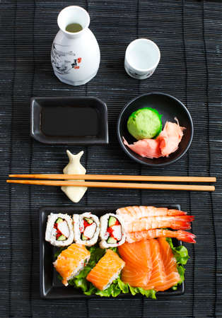 Sushi Set. Different sashimi, sushi and rolls, top viewの写真素材