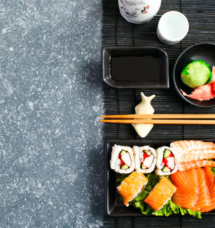 Sushi Set. Different sashimi, sushi and rolls, top viewの写真素材