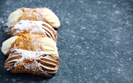 Sicilian cannoli stuffed with ricotta cheese. Cannoli Siciliani の写真素材