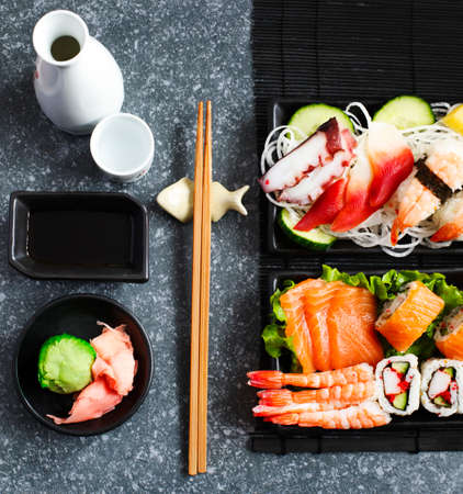 Sushi Set. Different sashimi, sushi and rolls, top viewの写真素材