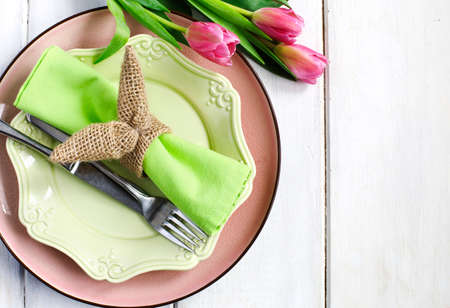 Easter table setting with fresh tulips, top viewの写真素材