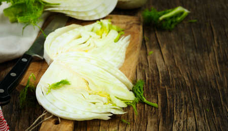 Fresh fennel bulb on cooking board, copy spaceの写真素材