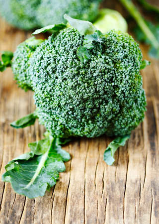 Fresh broccoli on wooden backgroundの写真素材